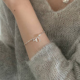 Morning Waltz · Bow-Knot Silver Bracelet
